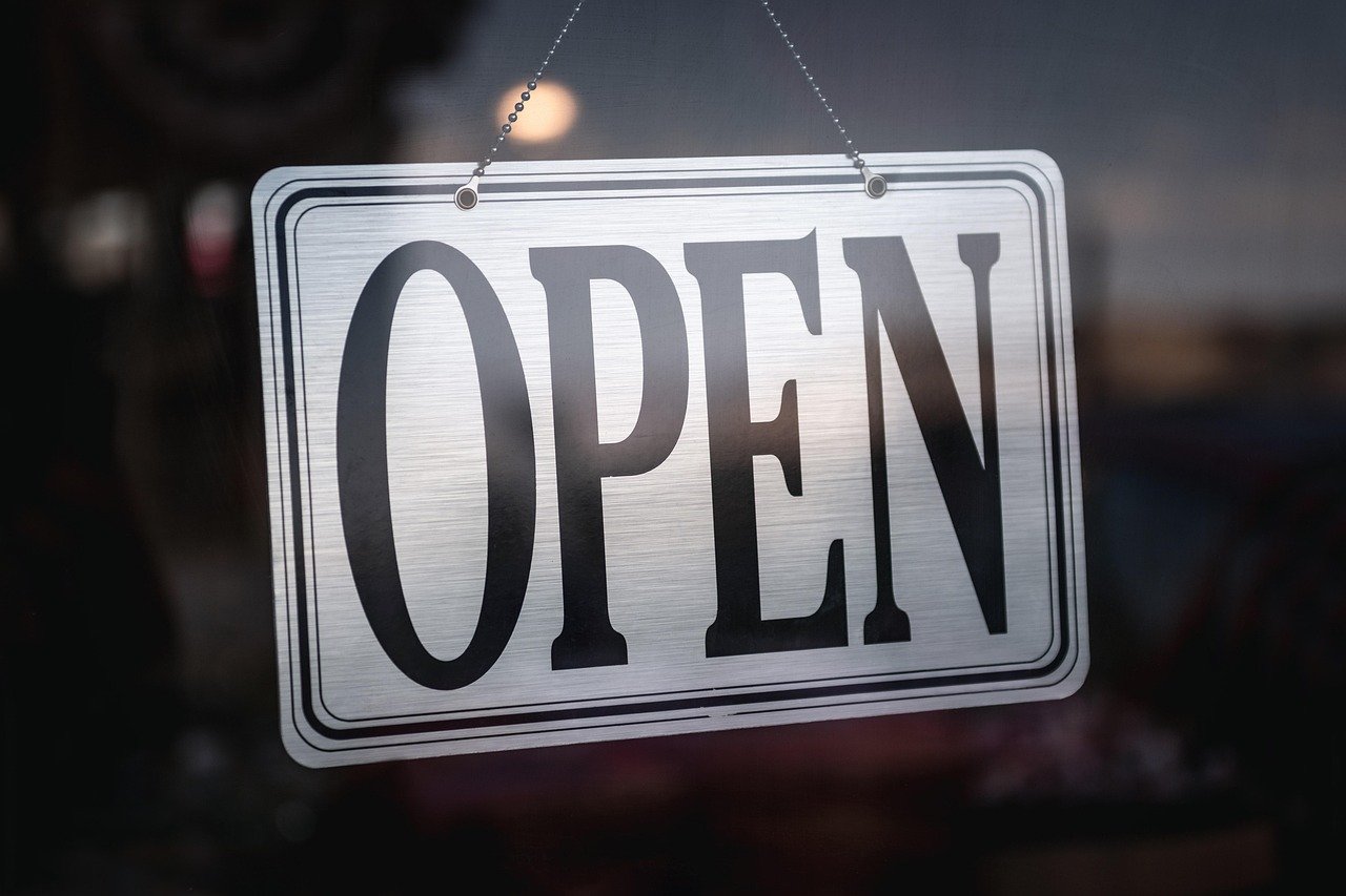 Illustration of separate local business location pages showing address, hours, services, and booking details.